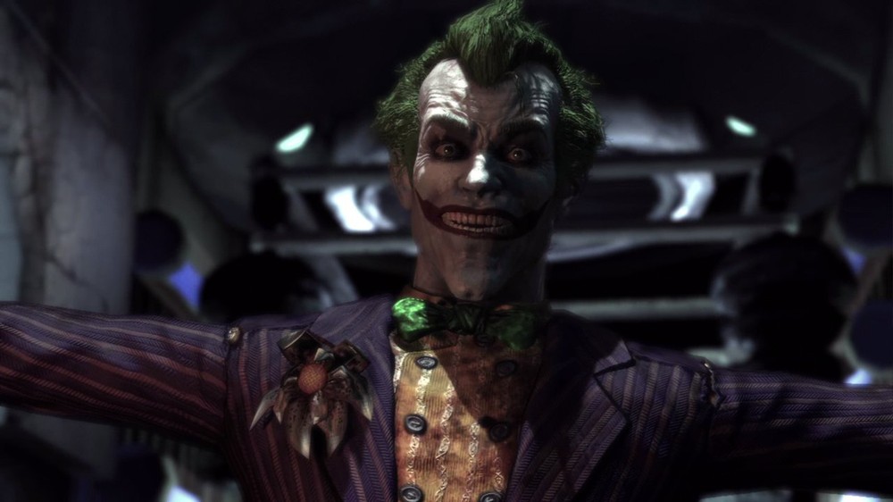 Em Arkham Knight, Coringa leva Batman à loucura, mesmo após sua morte nos acontecimentos de Arkham City — Foto: Reprodução/Jovem Nerd