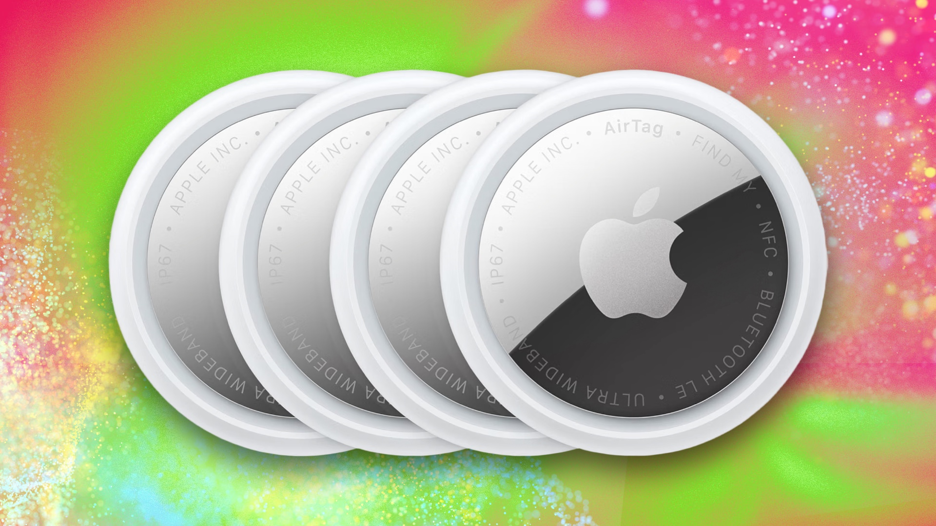 Four Apple AirTags on a green and pink background
